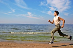 Man running on beach